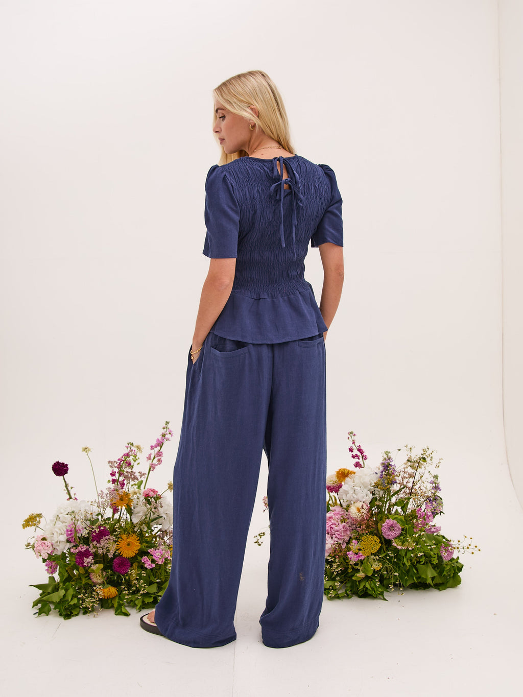 Marina Navy Peplum Top by Fika - Bare Fashion