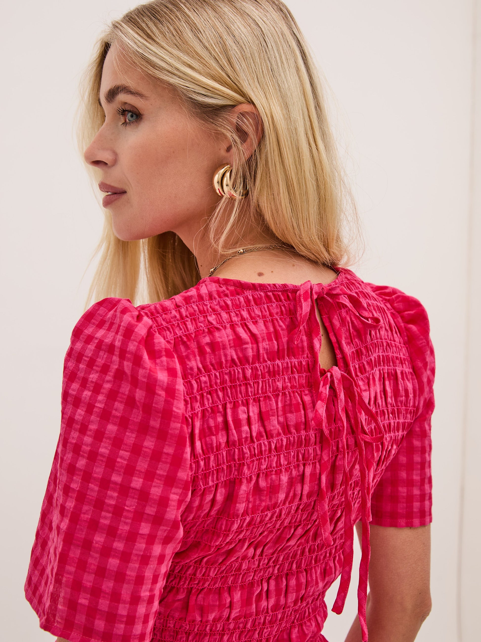 Marina Pink Gingham Peplum Top by Fika - Bare Fashion