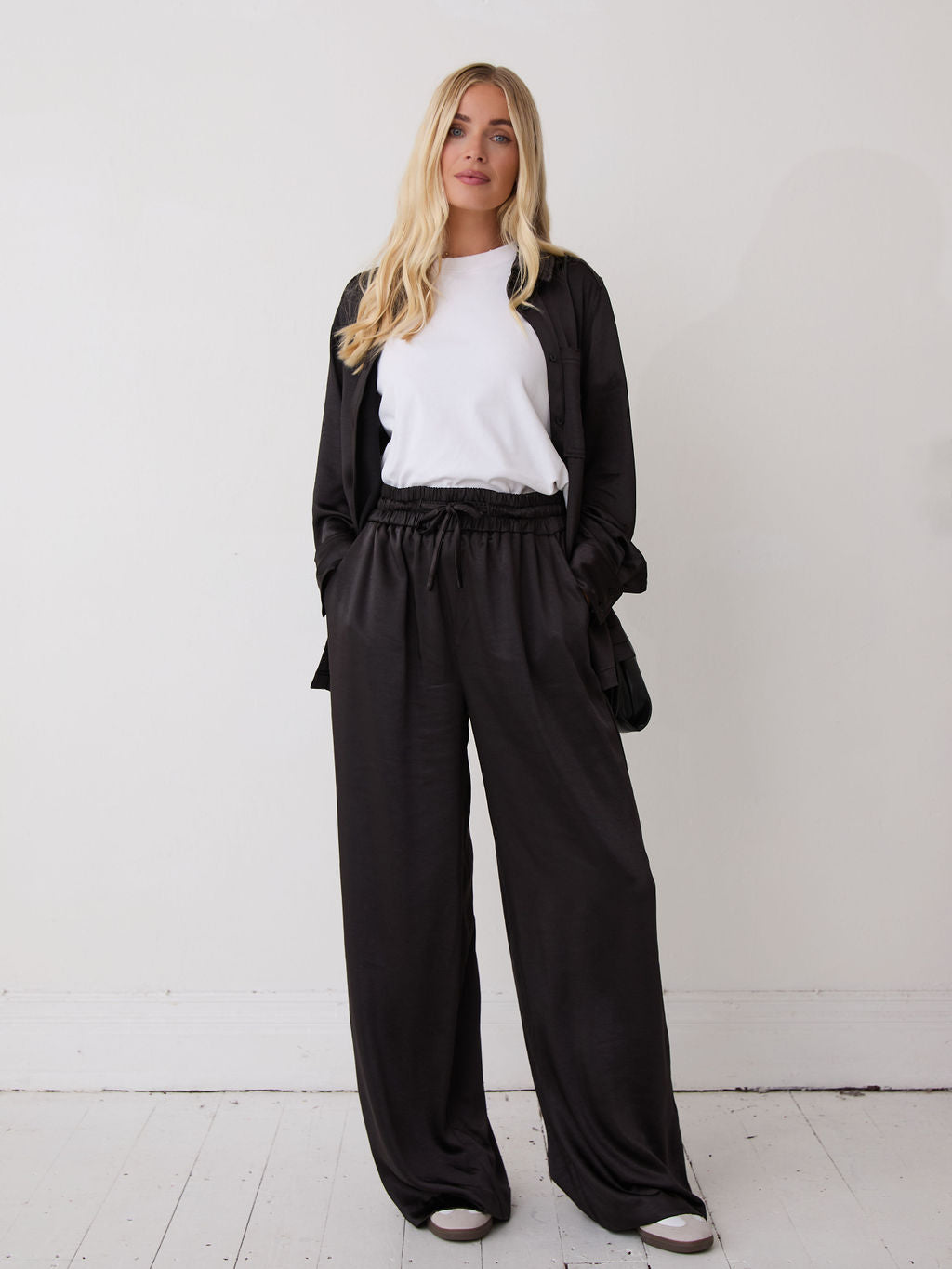 Ebba Black Satin Trousers by Fika - Bare Fashion